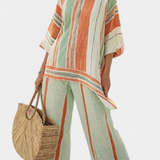 Елегантен комплект от лен и бамбук с райета и асиметрична блуза и широки панталони за изтънчен стил