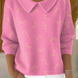 Елена – Коледна пуловер с принт на захарни пръчки