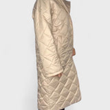 Габриела - Дълго капитонирано яке с модерен силует